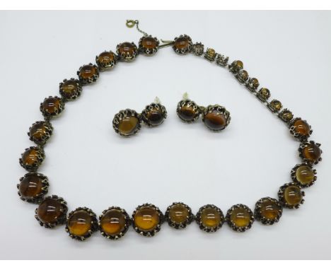 A 1950's Christian Dior necklet by Mitchel Maer, one stone missing and a matching pair of earrings