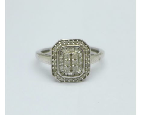 A silver and diamond set ring, W 