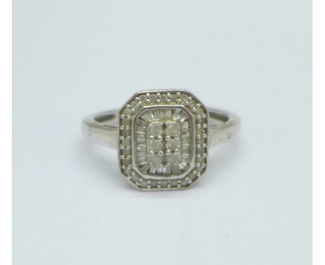 A silver and diamond set ring, W 