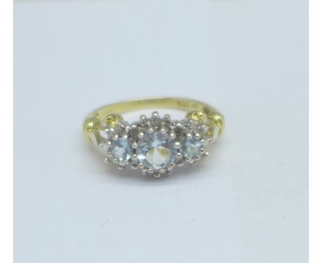 A 9ct gold, diamond and aquamarine ring, 3.1g, N 