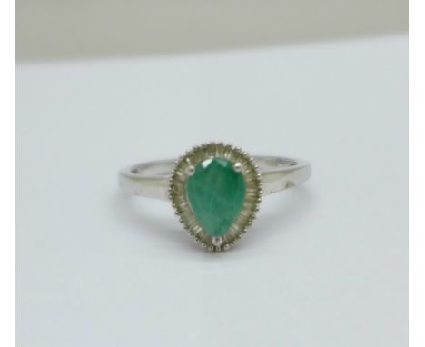 A silver, emerald and diamond set ring, T/U 