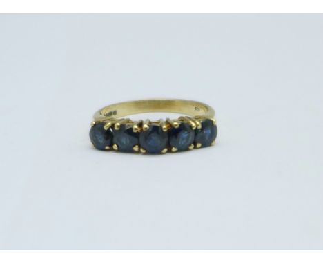 A 9ct gold, five stone sapphire ring, 2.3g, M 