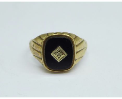 A gentleman's 9ct gold, onyx and diamond signet ring, 3.7g, Y 