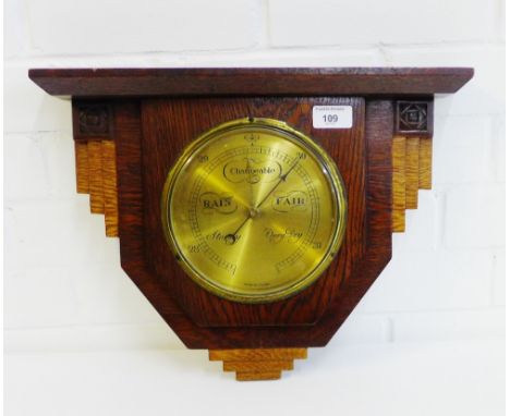 An Art Deco oak cased wall barometer, 40cm