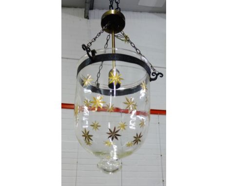 A glass and gilt patterned ceiling light with metal band to top, 34cm long