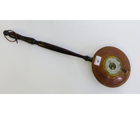 A wall barometer in the form of a miniature bed pan, 57cm long