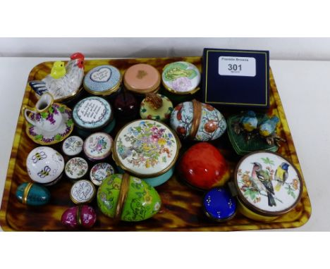 A collection of various enamel pill boxes to include Bilston and Battersea enamels by Halcyon Days, a ceramic hen-on-nest and
