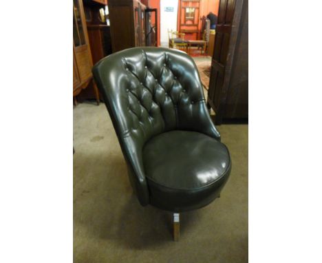 A green leather button back bedroom chair 