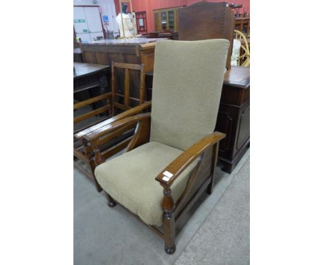 An Art Deco oak fireside armchair 
