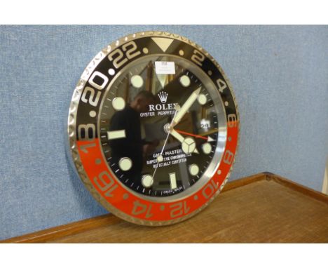 A Rolex style dealer's wall clock 