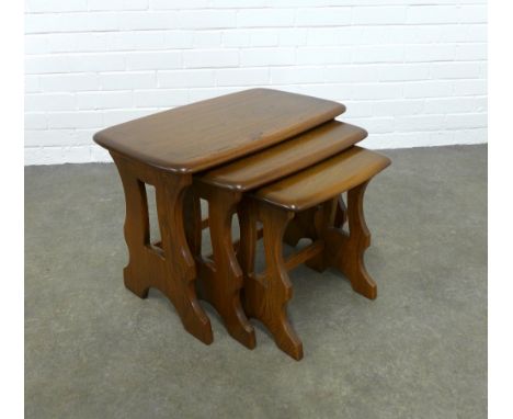 An Ercol golden Dawn elm nest of three tables, 57 x 42 x 35cm. (3) 