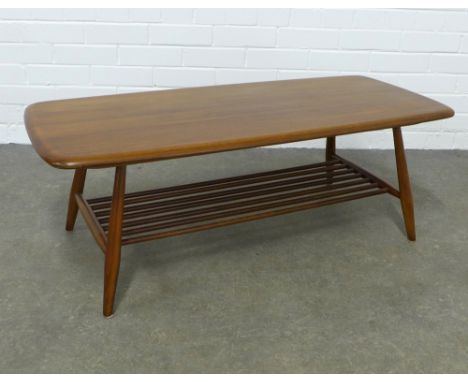 An Ercol Golden Dawn elm coffee table, 103 x 37 x 46cm. 