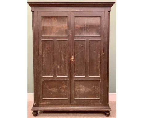 VINTAGE OAK TWO DOOR CUPBOARD - with interior shelves, the four panel doors flanked by quarter cut reeded pillars, on substan