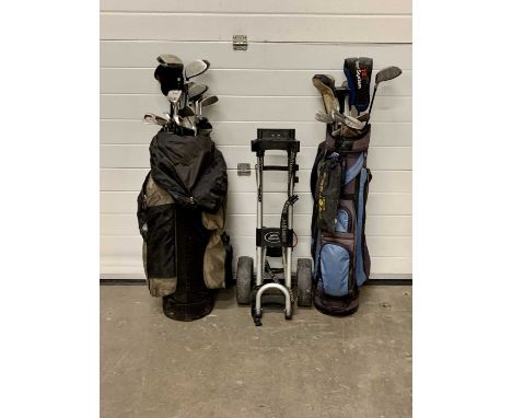 GOLFING INTEREST - two gold caddy bags and a Slazenger pull trolley, the bags containing a varied assortment of clubs by Ram,