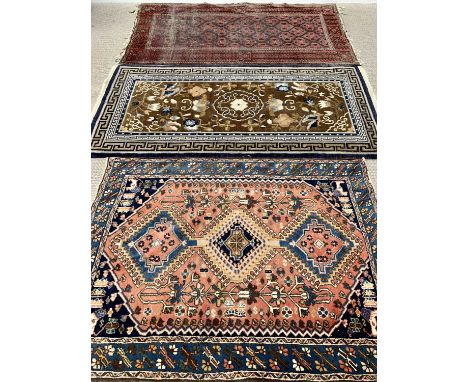 EASTERN STYLE RUGS (3) - to include a blue and brown ground Indian example with "Tibetan Refugee Self Help Centre" label atta