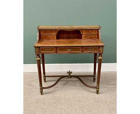 EMPIRE STYLE WRITING DESK - having various wood veneers and crossbanding with numerous gilt metal mounts and edging, pierced 