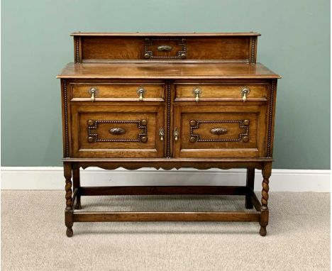VINTAGE OAK RAILBACK SIDEBOARD - with twin upper doors and lower cupboard doors, having brass pear drop handles, applied bead