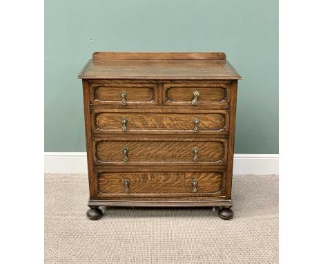 JACOBEAN STYLE VINTAGE OAK CHEST - having two short over three long drawers, with brass pear drop handles, on substantial tur