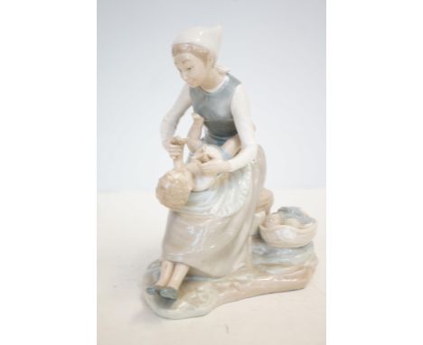 Nao figure of a mother & baby 