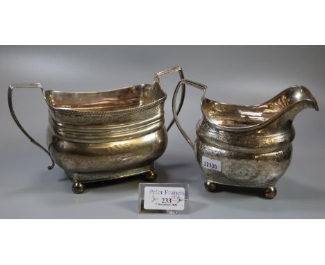 Part 19th century silver tea service, to include: two handled sucrier and cream jug, both standing on ball feet, rubbed hallm