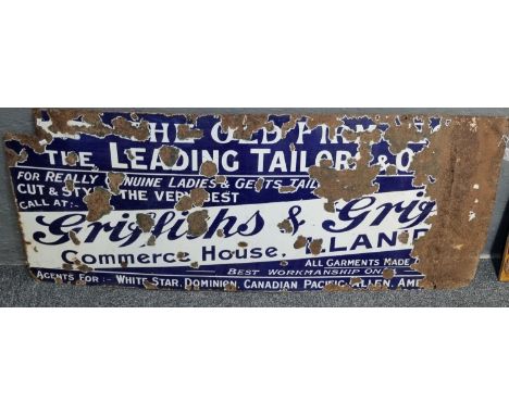 Large single sided enamel advertising sign 'Griffiths & ? the leading tailors' distressed condition, 63 x 150cm approx. (B.P.