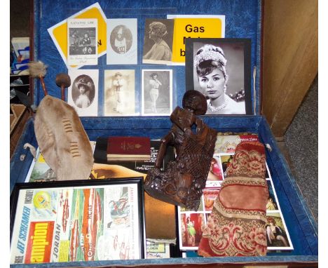 Vintage leather suitcase containing various ephemera: 'The complete Pirelli calendar book' by David Niven, family pictures an