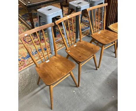 Set of three elm Ercol stick back kitchen chairs.  (3)  (B.P. 21% + VAT) 