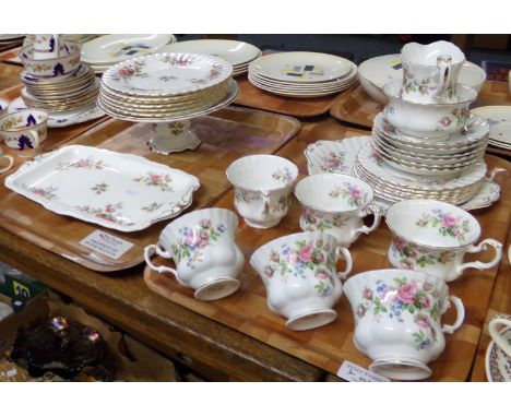 Three trays of china to include: two trays of Royal Albert 'Moss Rose' English bone china design items; teacups, sucrier, mil