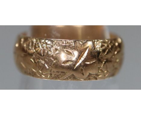 9ct gold engraved wedding ring. 3.8g approx. Size I &amp; 1/2.(B.P. 21% + VAT) 