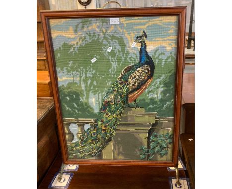 Tapestry fire screen depicting a peacock on a plinth.   (B.P. 21% + VAT) 