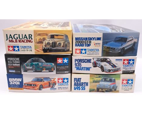 Tamiya, a boxed 1:24 scale plastic kit group comprising of high performance/rally/classic cars to include 1:24 scale BMW 320i