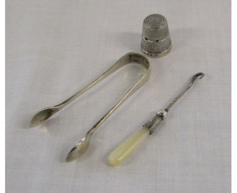 Small silver and mother of pearl button hook Birmingham 1922, thimble Birmingham 1926 & sugar tongs Birmingham 1923 total wei