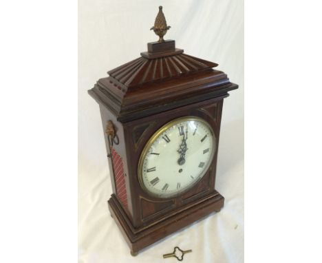 Georgian mahogany cased bracket clock with fishscale side panels, lion mask ring handles, pineapple finial &amp; a painted di