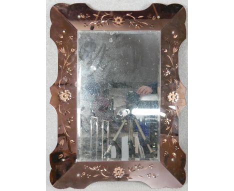 A Venetian style mirror with etched and shaped rose glass frame. H.80 W.58cm 