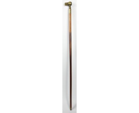 A brass and fruitwood telescope walking stick with brass extending lense on the top and brass collar. H.90cm 