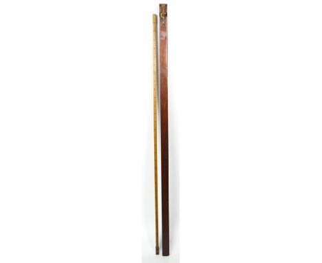 A Victorian extendable measuring stick in hardwood case by Booth Brothers, Dublin, with brass fittings. Measurements in feet.