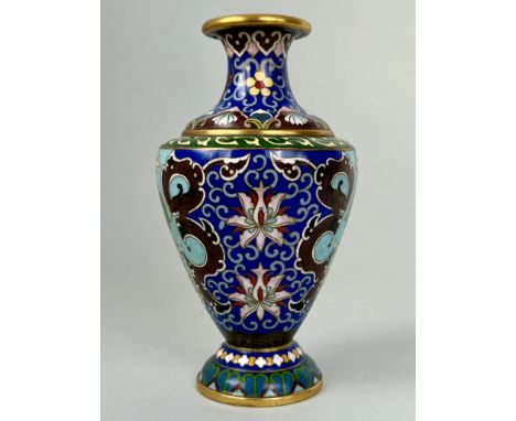 A pair of Chinese cloisonné vases with extensive decoration and dragon masks - 15.8cm high.   * Both vases have a minute pinh