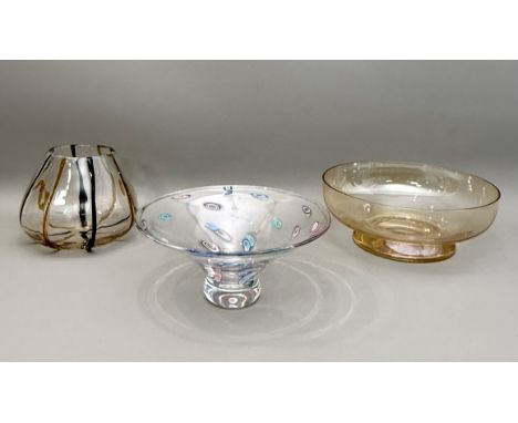 Three pieces of decorative vintage glass - comprising a clear glass vase with treacle and amber coloured trailed line Loetz s