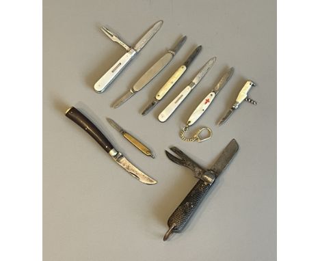 A small collection of vintage folding pocket and fruit knives - including a WW2 military issue army jack knife, the blade wit