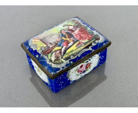 A late 18th/early 19th century enamel on copper box with profuse decoration of a loving couple&nbsp; in 18th century dress, f