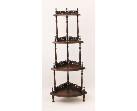 A 19th century style mahogany corner what-not - 20th century, with pierced, foliate carved backs to each shelf, raised on spi