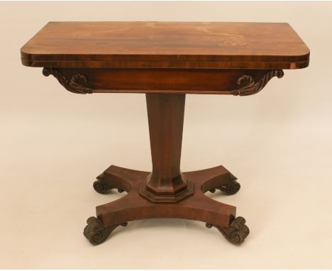 A William IV mahogany D-shaped fold-over card table - the baize-lined top a/f, over a foliate carved frieze, raised on an oct
