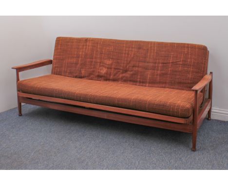 A&nbsp;1960s 'Manhattan' teak sofa bed by Guy Rogers - the angular teak frame with shaped open arms and turned tapered legs, 