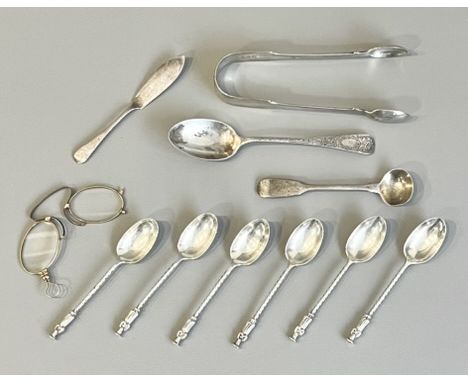 A small group of 19th and early 20th century silver flatware - including a pair of fiddle pattern sugar tongs; a set of six a