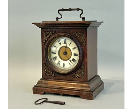An early 20th century Junghans walnut cased mantel or table clock with musical alarm - the signed movement with alarm setting
