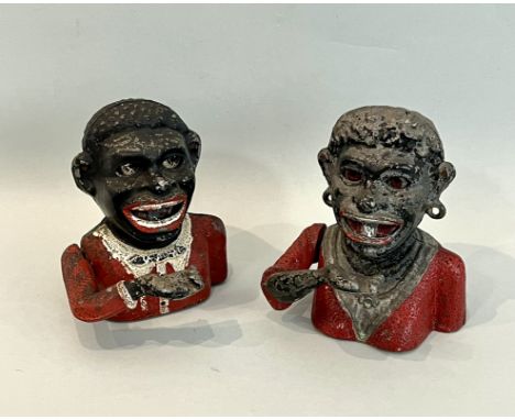 Two cast alloy Jolly N and Dinah money banks - early 20th century, with original painted finish, 16.5cm high, both with paint