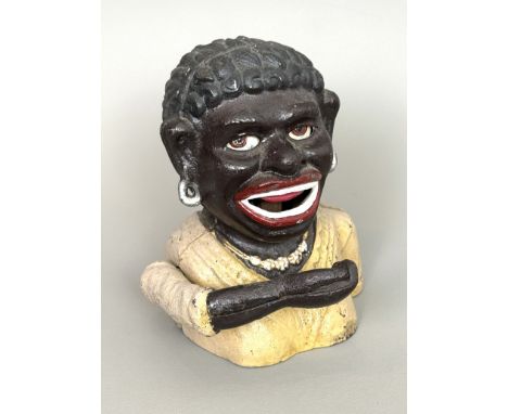 A reproduction cast iron 'Dinah' money bank - 13cm high. Notice from the the-saleroom.com: These items are listed on the basi