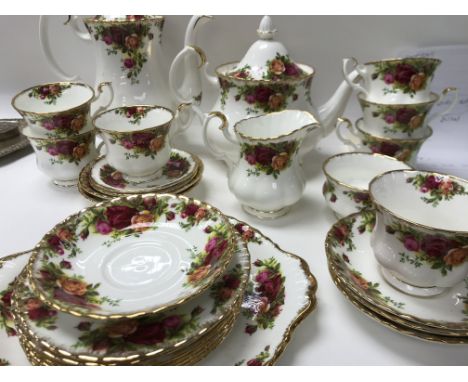 A royal Albert country rose tea coffee service including cups saucers jug coffee/ tea pot .