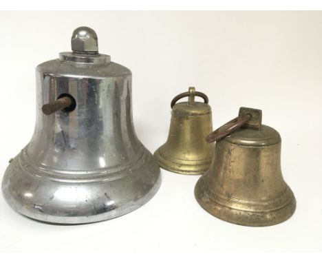 A Vintage Chrome fire engine bell Hight 26cm and two cast brass bells (3)