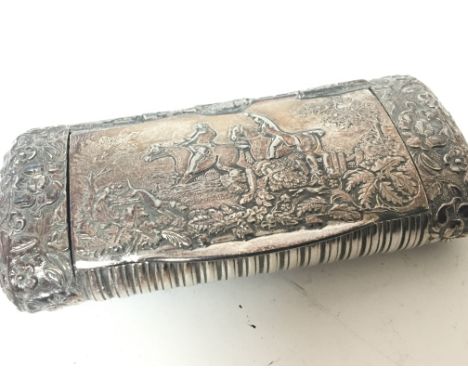 A white metal late 19th century snuff box decorated with hunting scenes possibly Continental. 11x5cm